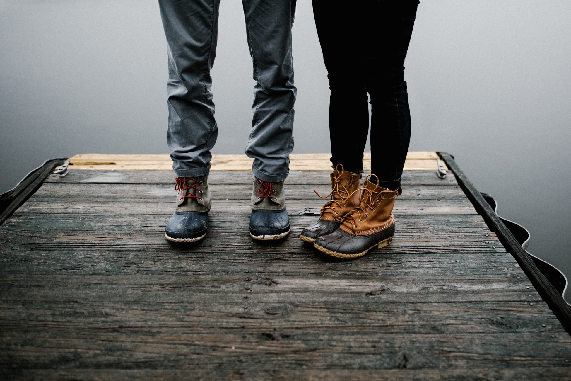 couple standing on dock